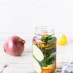 clear glass bottle on white table